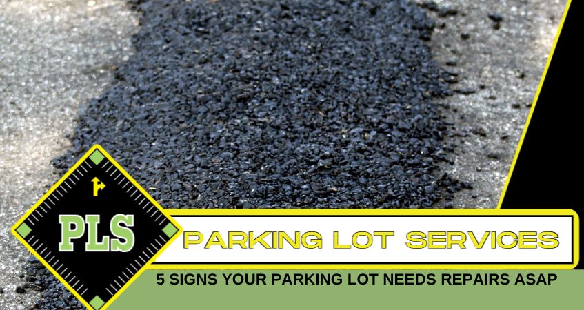 Sealcoating being applied to asphalt parking lot surface