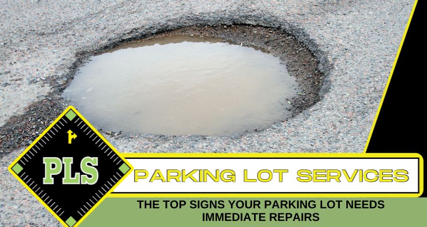 A parking lot with visible cracks and potholes needing repair
